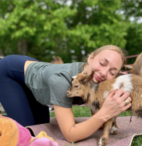 Goat Snuggles with Ashley Flowers Yoga at Smiling Hill Farm