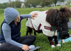 Yogi and Mini Horse Toast during Mini Horse Yoga